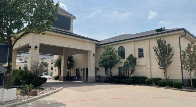 Кровать в общем номере Quality Inn & Suites Weatherford