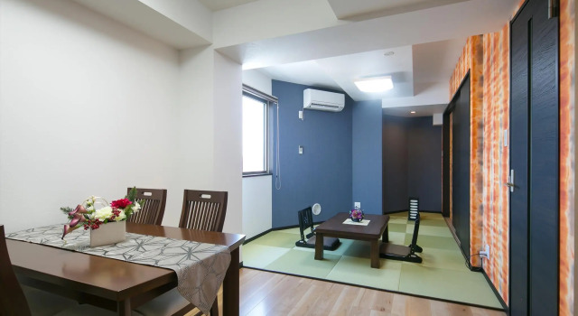 Кровать в общем номере с 6 комнатами Ikidane Residential Hotel Machiya