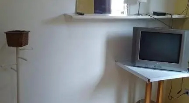 Кровать в общем номере Hostel Ta em Casa