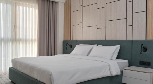 Suite con balcone STYLO Residences & Suites