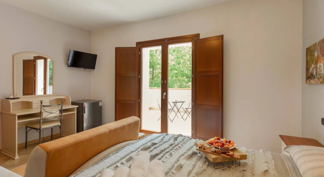 Люкс Deluxe с балконом Agriturismo La Sfruscià