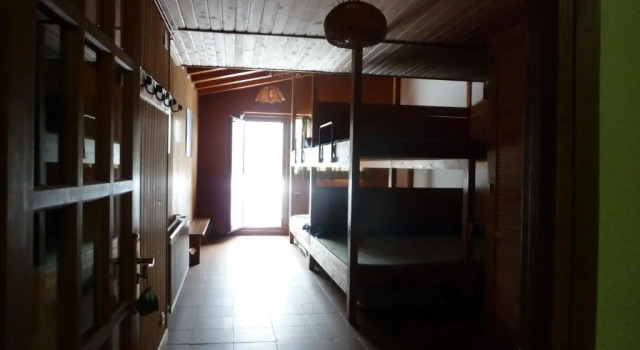 Кровать в общем номере Albergue "El Aguila"