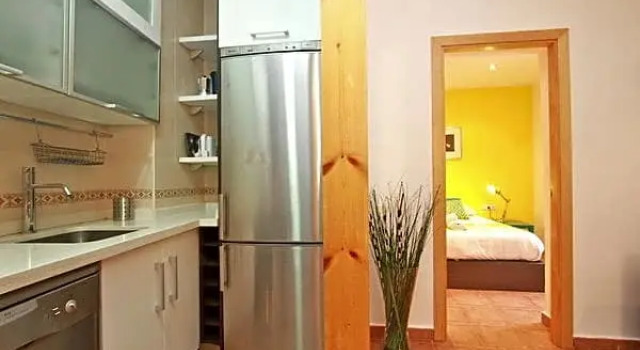 Кровать в общем номере с 2 комнатами Apartamentos Nest Flats Casa de la Alberca