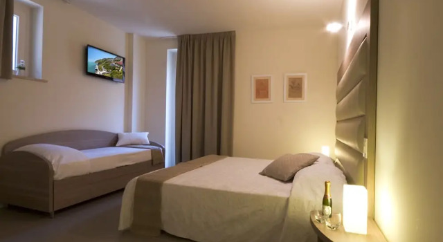 Четырёхместный номер Classic Palazzo Ruschioni Boutique Hotel