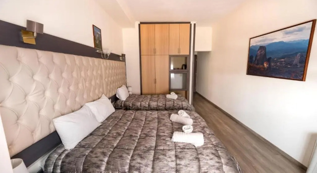 Четырёхместный номер Standard Famissi Eden Hotel