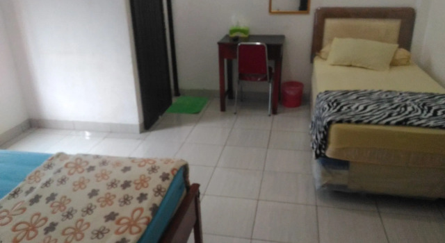 Losmen Ibu Hj. Tarjo, Rezervovat Hotel Palembang Sumatra