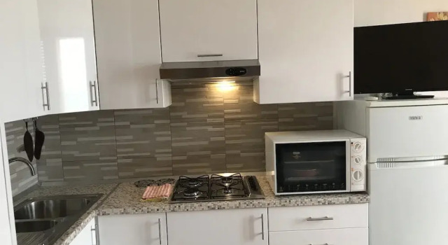 Апартаменты c 1 комнатой с балконом Appartamento Conturrana 5 posti letto sul mare