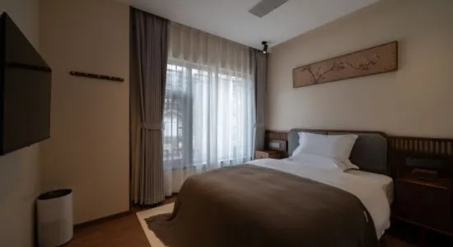Двухместный семейный люкс Deluxe He garden hotel