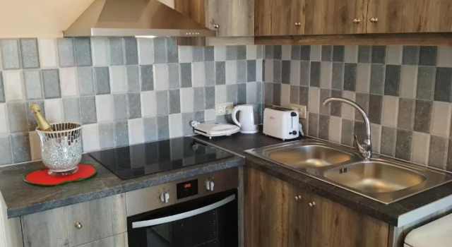 Апартаменты Casa De Rosa Apartments & Studios