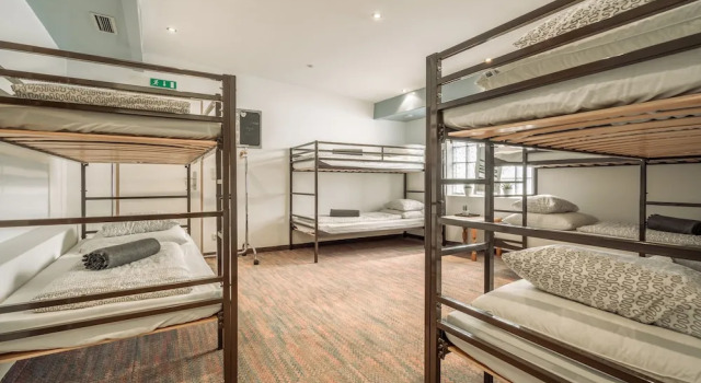 Кровать в общем номере Fortuna Apart Hotel B&B