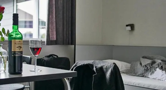 Кровать в общем номере Motel Skive