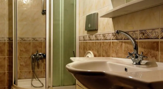 Кровать в общем номере Terrace House Hotel