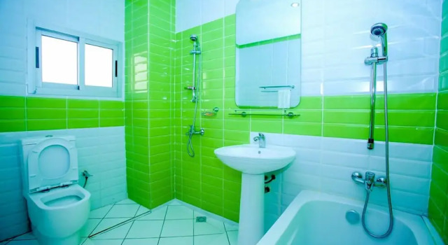 Кровать в общем номере Complexe Hôtelier Akparo