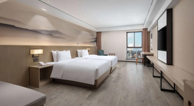 Четырёхместный номер Deluxe Ramada Encore by Wyndham Kunming Guandu