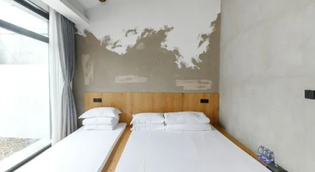 Кровать в общем номере Beijing Dayin Yushi Jingyin Nanshan Resort