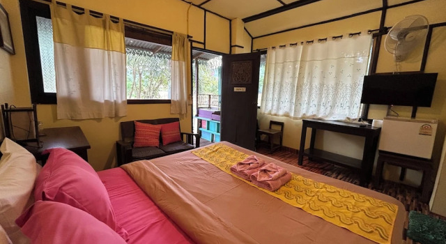 Номер Deluxe บ้านไม้คนเมือง Baan Mai Kon Muang Pai Resort