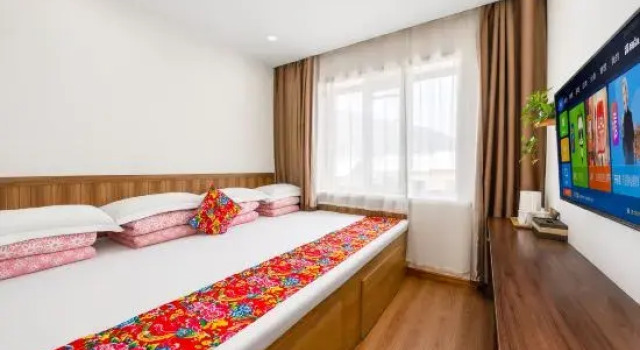 Кровать в общем номере Xiaoxia Homestay