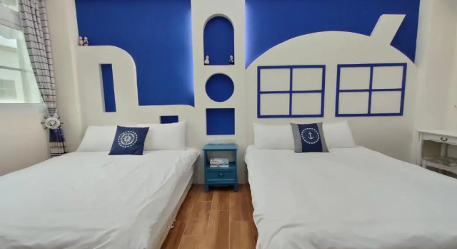 Четырёхместный номер Standard с балконом Xiao Ya Homestay