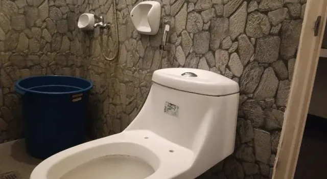 Кровать в общем номере Hotel Villarte Fort Pampanga