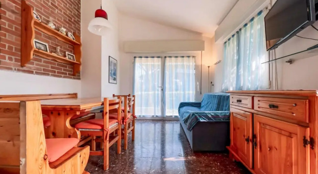 Вилла с 2 комнатами с видом на сад Villa with garden on the shores of Bibione