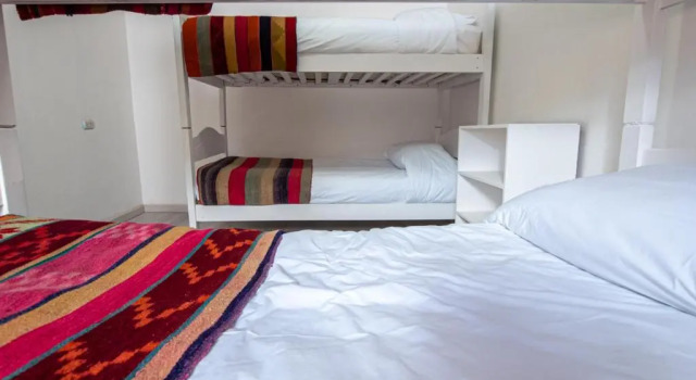 Кровать в общем номере Hostal Copart