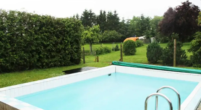 Апартаменты Schone Zweizimmer-ferienwohnung mit Pool im Garten