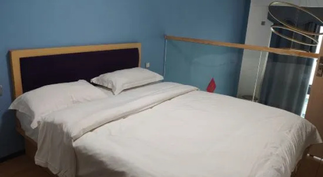 Двухместный люкс Luxury Дуплекс с 3 комнатами Dongguan Huatang Business Apartment