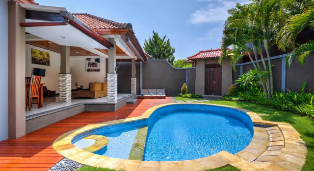 Кровать в общем номере с 2 комнатами Gracia Bali Villas & Apartment by Manara