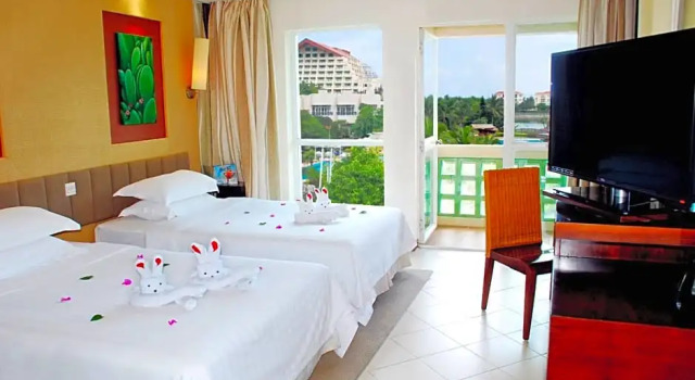 Двухместный номер Standard с балконом и с видом на сад Cactus Resort Sanya by Gloria