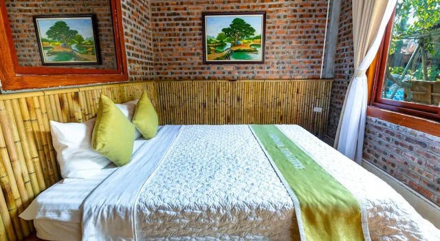 Двухместный номер Deluxe с балконом и с видом на сад Green Peace Bungalow