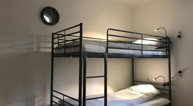 Vuode makuusalissa Passpartout Hostel