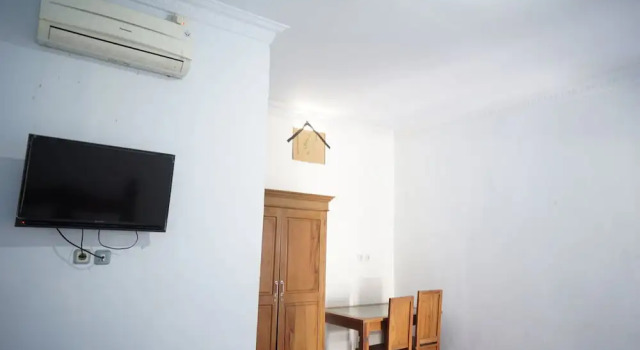 Номер Deluxe OYO Life 92886 Rumah Nyaman Radhika 2 Syariah