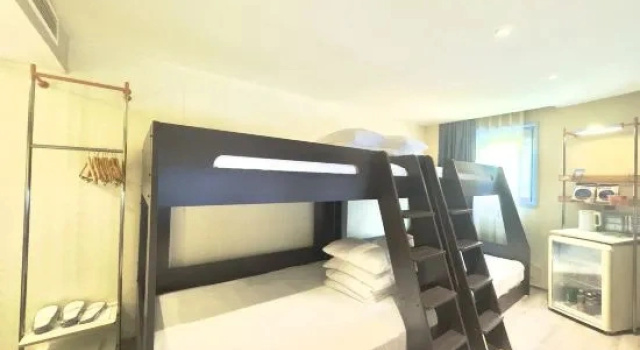 Кровать в общем номере Netfish Esports Hotel (AntingSubwayStationBranchShanghaiAutomotiveConventionandExhibitionCenter)