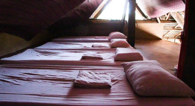 Кровать в общем номере Malayah Hostel