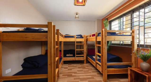 Кровать в общем номере Little View Homestay