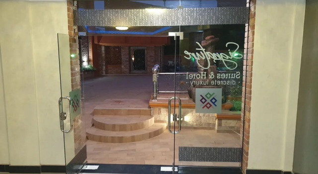 Signature Suites & Hotel