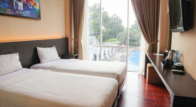 Номер Deluxe Oasis Siliwangi Sport Hotel