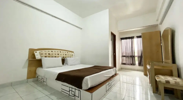 Апартаменты с 2 комнатами OYO 90184 Api Api Guesthouse 533