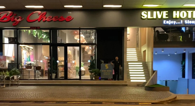 Кровать в общем номере Slive Hotel