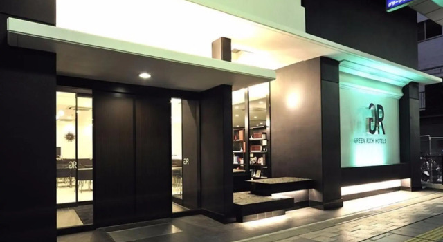 Кровать в общем номере Green Rich Hotel Iwakuni Ekimae