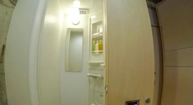 Кровать в общем номере Konyamachi Guest House Kuku