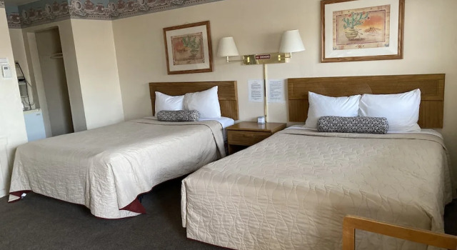 Standardowy czteroosobowy pokój Rainbow Inn & Cottages