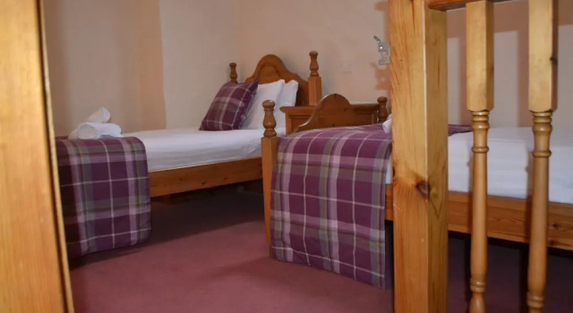 Четырёхместный номер Comfort Walshs Hotel and Apartments
