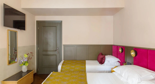 Трёхместный номер Condominio Monti Boutique Hotel