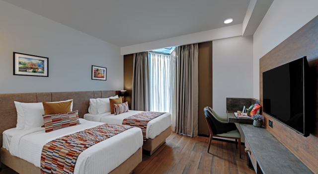 Кровать в общем номере Hays AIR By Ahuja Residences - Golf Course Ext Road & Sector 51