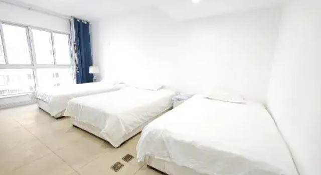 Кровать в общем номере Orange Audiovisual  Hotel