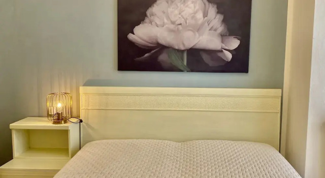 Bett im Wohnheim (Männerwohnheim) 1 Schlafzimmer mit Balkon Mansarda