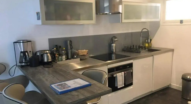 Апартаменты Appartement avec jardin et parking