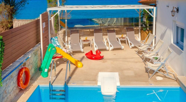 Коттедж Thalassa Beachfront Villa with private pool