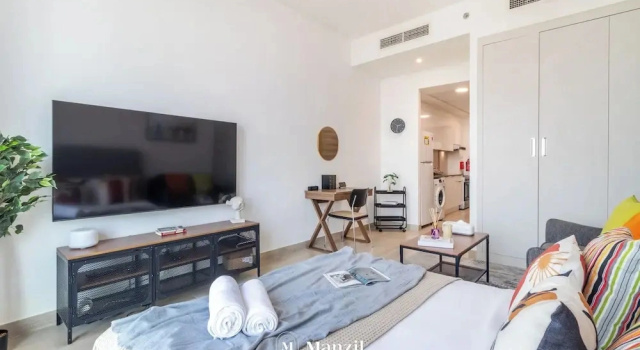 Manzil - Sleek Studio with Pool in JVC
